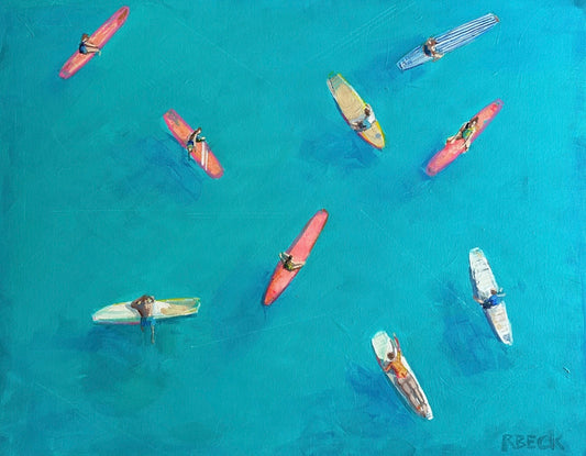 Coastal fine art print of an aerial view of surfers at rest in rich teal water with vibrant coral accents by Ryan Beck.
